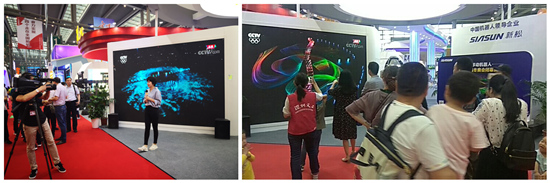 1526546927621572.jpg 1媒體在新松參展機(jī)器人前做新聞報(bào)道_副本.jpg